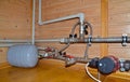 Heating system with plastic pipes and expansion tank
