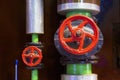 Heating system's metal pipes with cast-iron valves Royalty Free Stock Photo