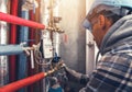 Heating Technician Making Final Check of the System Royalty Free Stock Photo