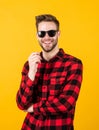 Heating up the wild west. handsome man in sunglasses. indoor portrait of sexy european businessman. confident and calm