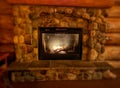 Heating , warmth, fire and cosiness concept . closeup of burning fireplace at home - image