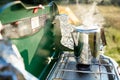 Heating water for coffee on a gas burner