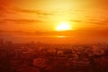 Heatwave on the city with the glowing sun background Royalty Free Stock Photo