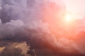 Heaven. Epic Dramatic storm cumulus clouds with yellow orange sun and sunlight