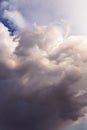 Heaven. Epic Dramatic storm grey white cumulus clouds in sunlight abstract background texture Royalty Free Stock Photo