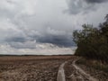 Heaven before thunderstorm over the field Royalty Free Stock Photo