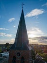 Heavenly Dawn: Church tower Bathed in Sunrise Glow