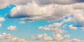 A heavenly landscape. Clouds in the blue sky. Bright warm colours Royalty Free Stock Photo