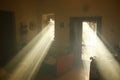 Heavenly light in a dusky old house. Royalty Free Stock Photo