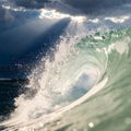 Heavenly Light on a Powerful Crashing Ocean Wave Royalty Free Stock Photo