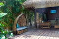 heavenly vacation on phi phi don island in thailand in a hotel with bamboo bungalow among palm trees Royalty Free Stock Photo