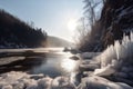 heavenly view of wintery river frozen over with icicles hanging from the edge