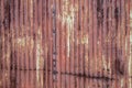 Heavily Corrugated Stripped Reddish Metal Texture
