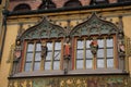 Heavily decorated wall on the Ulm Town Hall in Germany with statuettes of kings by the windows Royalty Free Stock Photo