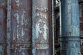 Heavily rusted pipes and tubes, peeling paint industrial background Royalty Free Stock Photo