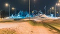 Heavily snow-covered road and sidewalk in an industrial town in Silesia, Poland, JastrzÃâ¢bie-Zdroj at night Royalty Free Stock Photo