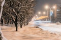 Heavily snow-covered road and sidewalk in an industrial town in Silesia, Poland, JastrzÃâ¢bie-Zdroj at night Royalty Free Stock Photo