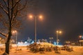 Heavily snow-covered road and sidewalk in an industrial town in Silesia, Poland, JastrzÃâ¢bie-Zdroj at night Royalty Free Stock Photo