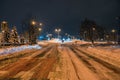 Heavily snow-covered road and sidewalk in an industrial town in Silesia, Poland, JastrzÃâ¢bie-Zdroj at night Royalty Free Stock Photo