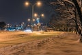 Heavily snow-covered road and sidewalk in an industrial town in Silesia, Poland, JastrzÃâ¢bie-Zdroj at night Royalty Free Stock Photo
