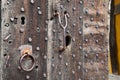 Heavily studded oak door at entrance to castle