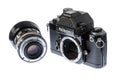 Heavily Worn Nikon F2S Body With Detached Lens Isolated on White Royalty Free Stock Photo