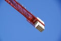 Heavy cement blocks are used as counterweights to balance a tower crane during construction on a Tower Crane Cement