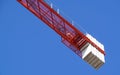 Heavy cement blocks are used as counterweights to balance a tower crane during construction on a Tower Crane Cement
