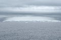 Heavy Cloud Formation Above An Iceberg, Antarctica