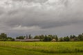 Heavy clouds over a typical village on a windy dayfor print