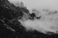 Heavy clouds on the sharp Tatra mountain, black and white with n