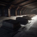 Heavy coffins lie on sand floor in an very small old dusty cemetery crypt in a cave