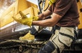 Heavy Construction Equipment Operator Wearing Safety Gloves Royalty Free Stock Photo