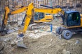 Heavy construction equipment working at the construction site Royalty Free Stock Photo