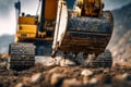 Heavy construction excavator digging and lifting soil on an active outdoor building site preparing ground for new infrastructure Royalty Free Stock Photo