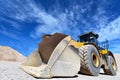 Heavy construction machine in open-cast mining - wheel loader tr Royalty Free Stock Photo