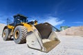 Heavy construction machine in open-cast mining - wheel loader tr Royalty Free Stock Photo