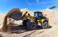 Heavy construction machine in open-cast mining - wheel loader tr Royalty Free Stock Photo