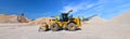 Heavy construction machine in open-cast mining - wheel loader tr Royalty Free Stock Photo