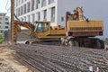 Heavy construction machineries and steel material