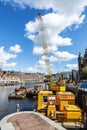 Heavy crane on a pier of a canal in Amsterdam, Netherlands