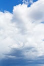 Heavy cumulus clouds in blue sky