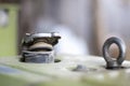 A heavy diesel walk-behind tractor for plowing a garden is in a garage or shed. Typical walking tractor. Motor cultivator with a Royalty Free Stock Photo