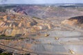 Heavy dump truck carrying the iron ore on the opencast mining aerial view. Royalty Free Stock Photo