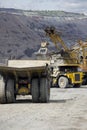 Heavy dump trucks at the loading queue Royalty Free Stock Photo