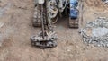 A Heavy Duty Drilling Machine is being utilized efficiently at a bustling Construction Site Royalty Free Stock Photo