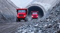 Heavy Duty Dump Trucks operate efficiently in a mining tunnel, serving various purposes and functions Royalty Free Stock Photo