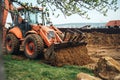 heavy duty earth moving bulldozer doing landscaping and moving soil Royalty Free Stock Photo