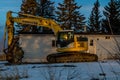 Heavy duty excavtor waits for the work to start. Calgary Alberta Canada