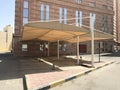 Heavy duty Fabric Tensile shade structures for an parking lot for the Customers of an reputed five star hotel building outdoor Royalty Free Stock Photo
